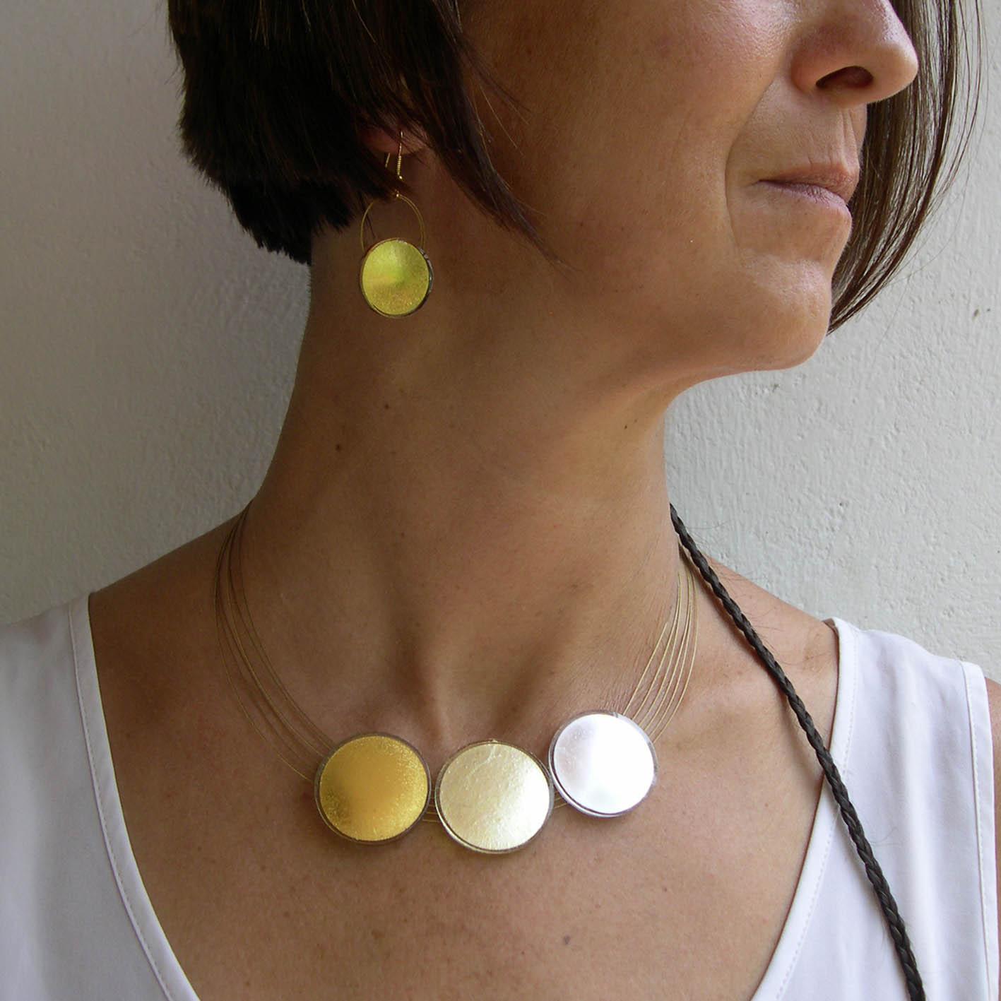 Sun necklace (SN3), 3 suns in gold, yellow and silver, 43 cm circumference, which can get prolonged on request.