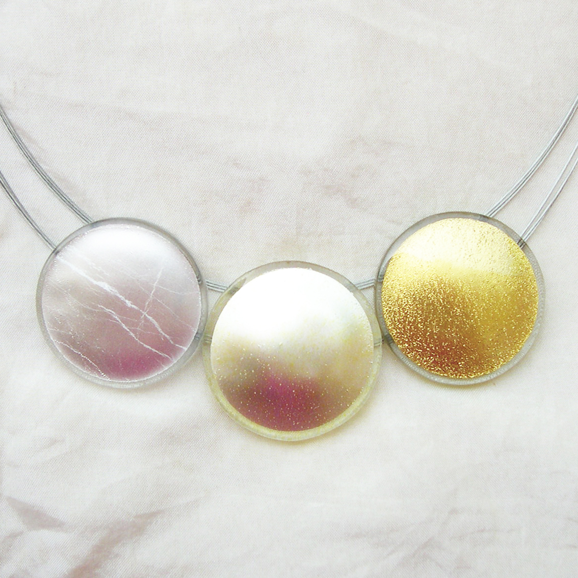 Variation, every necklace is varying, as they are all handmade and unique.
