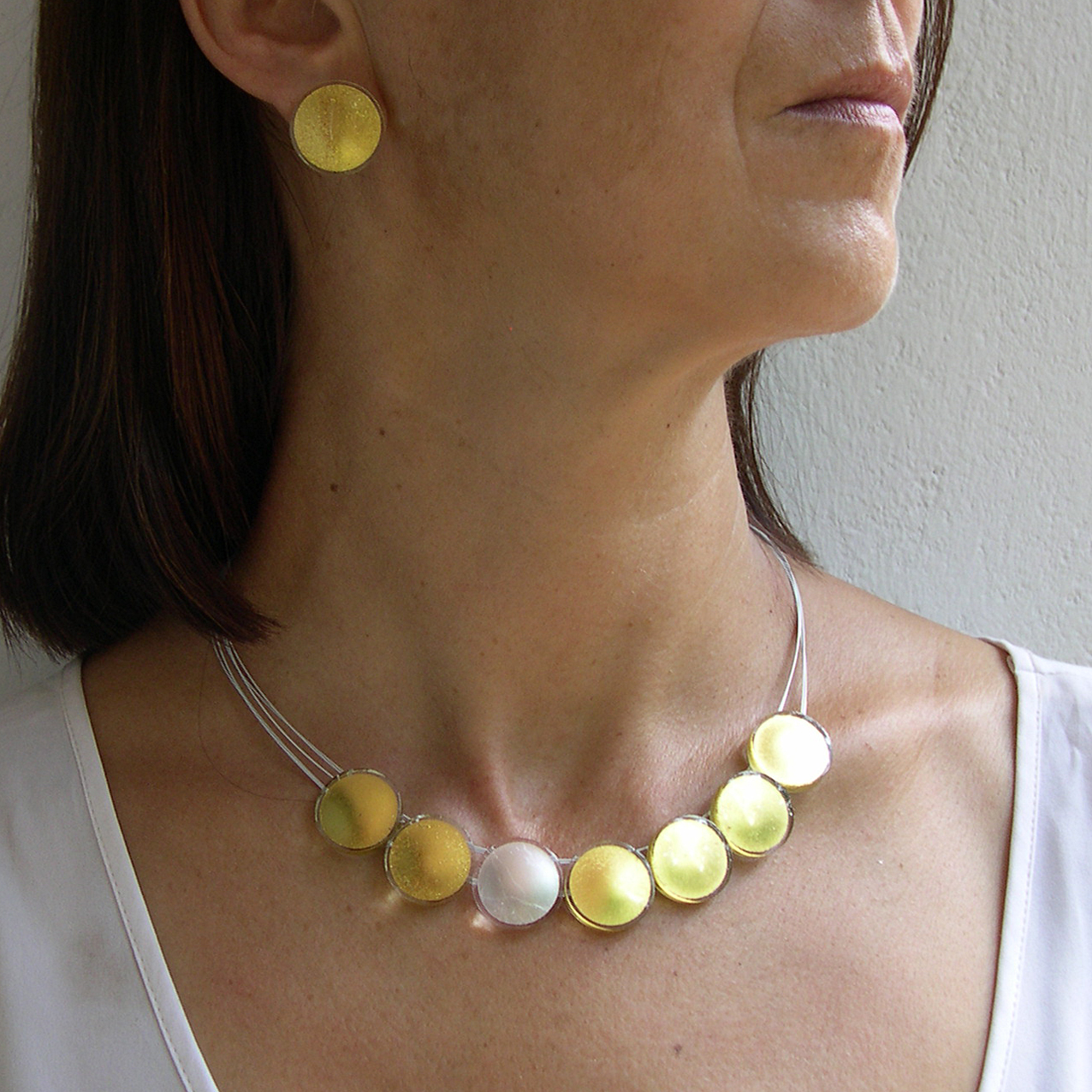 Sun necklace (SN72) on a model, with stud earrings (S2ES)
