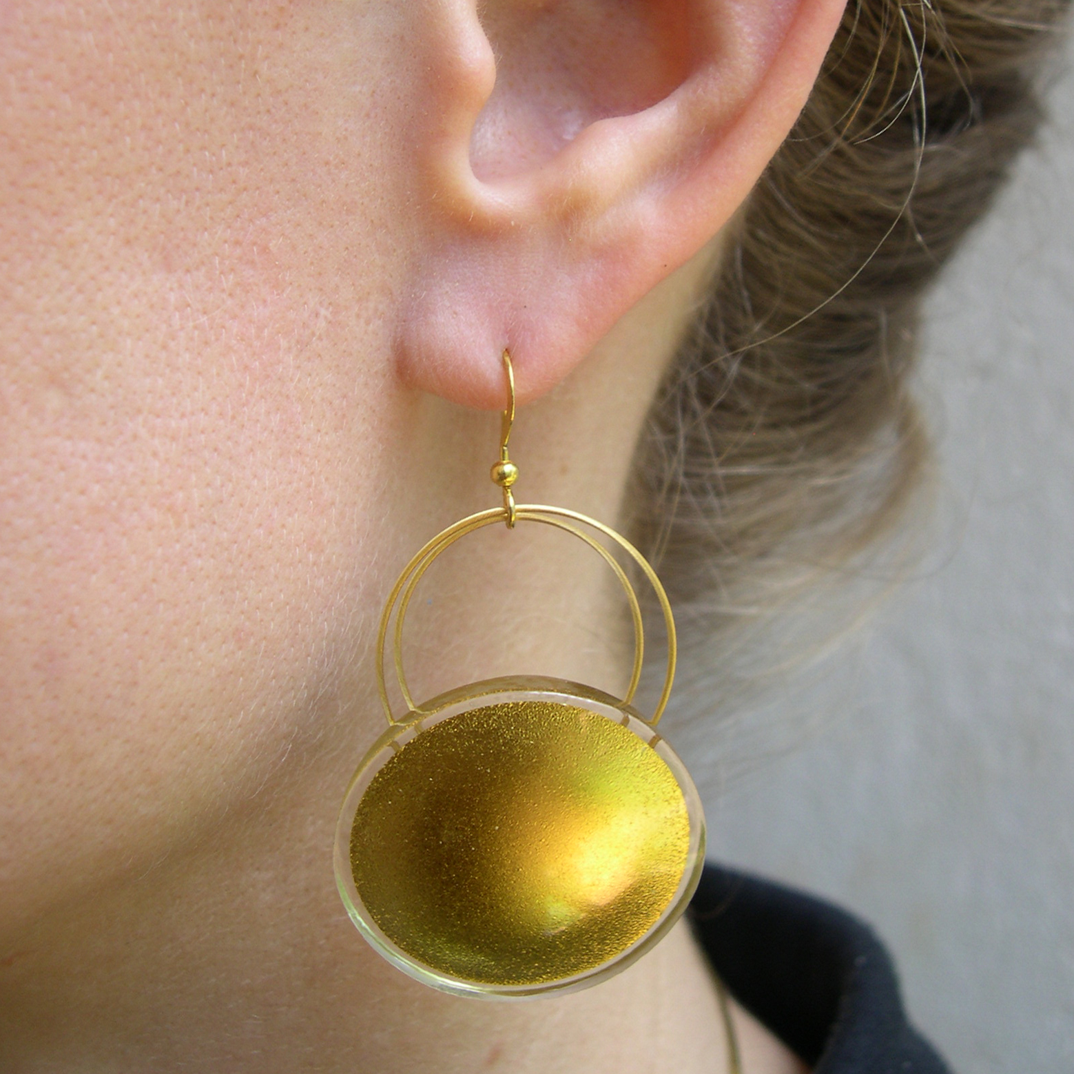 Sun hanging earrings 3 cm (S3EH) on a model evtl S23EH