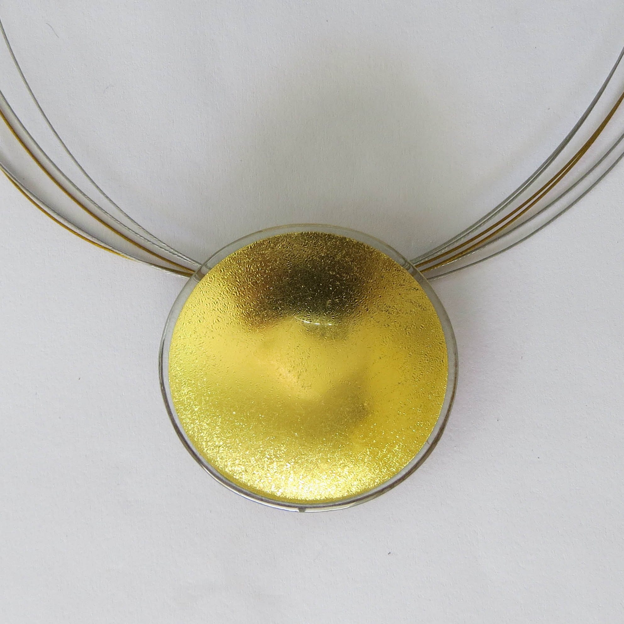 Sun pendants in all available sizes: 2.1 cm, 3 cm, 4 cm, 5.5 cm, 7 cm, 8.5 cm