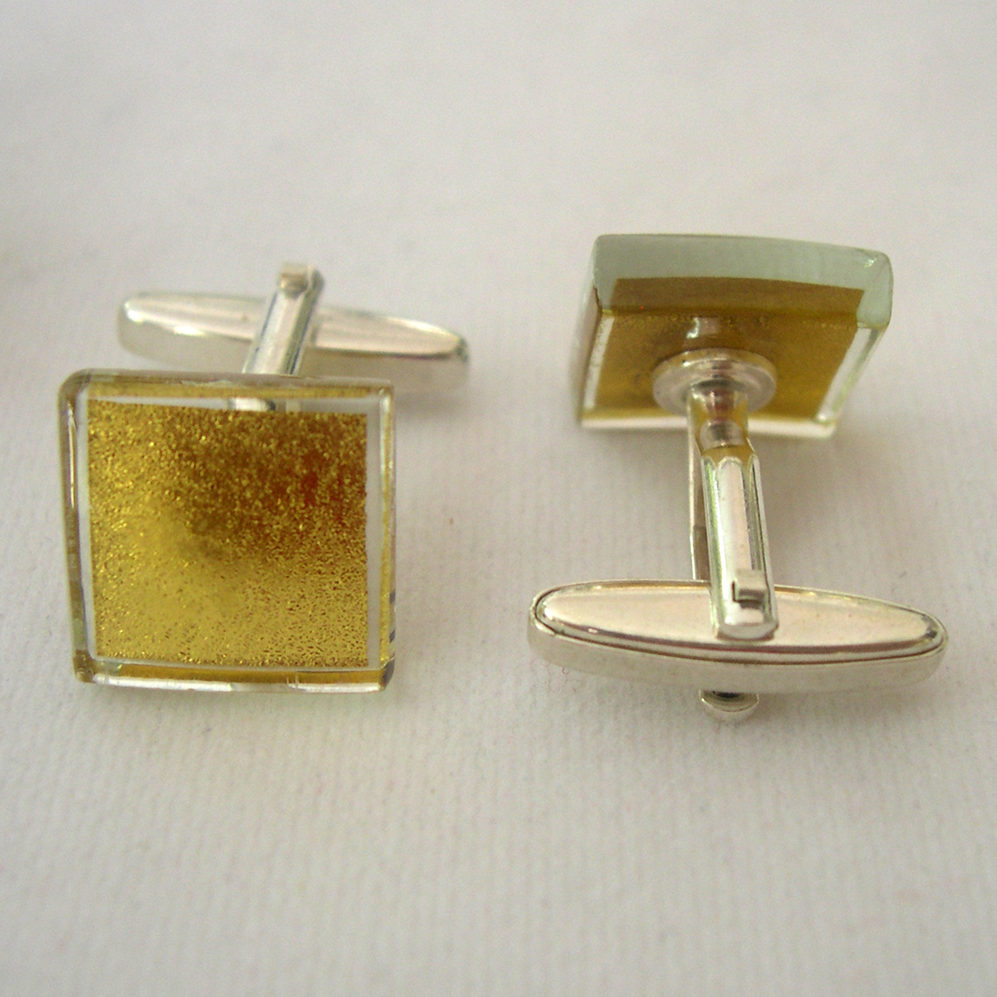Small square cufflinks 1.5 cm (R15MCs), with a high quality sterling silver fitting.