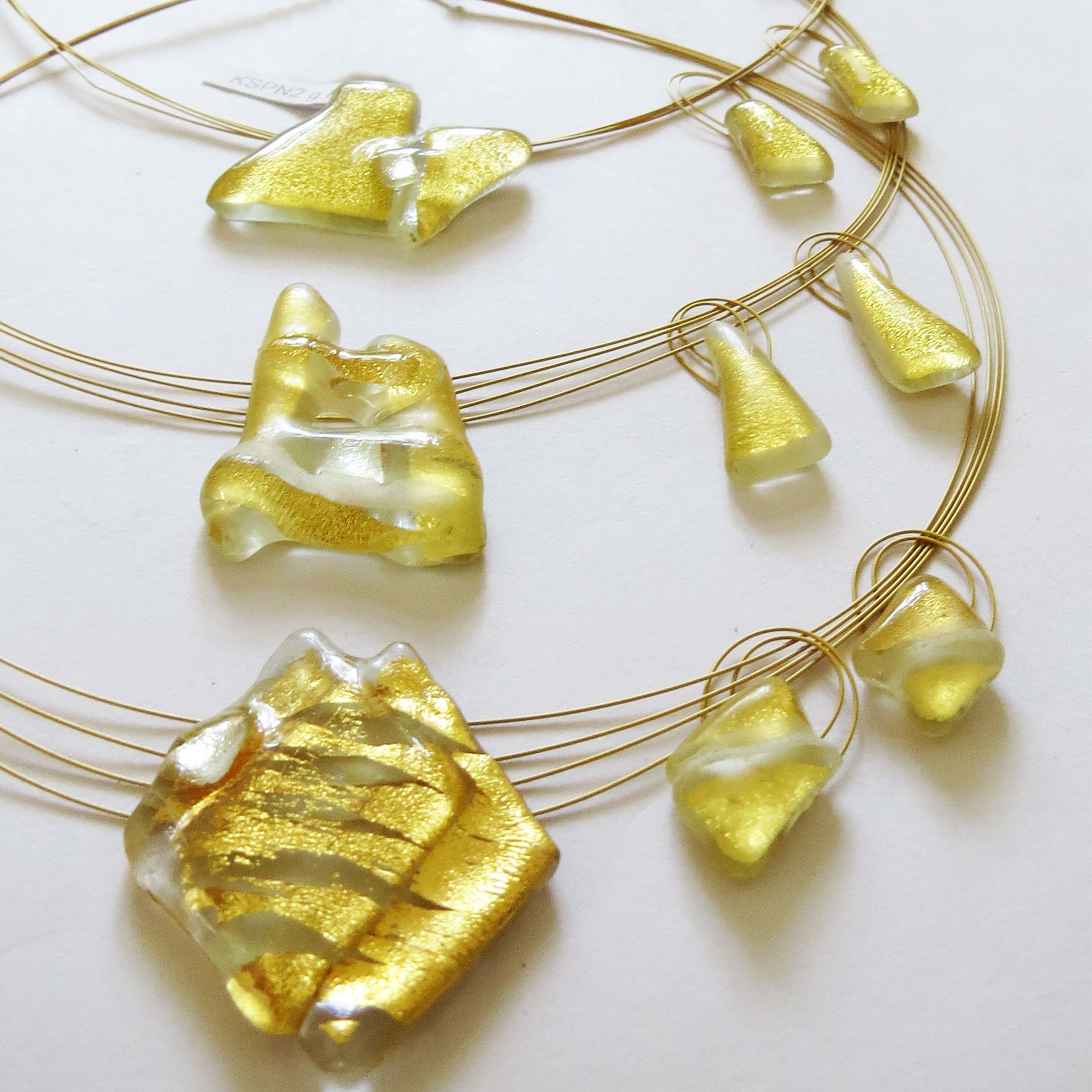 3 sparkling Gold Creation sets (KSPN2 d, e, g), single pieces with hanging earrings