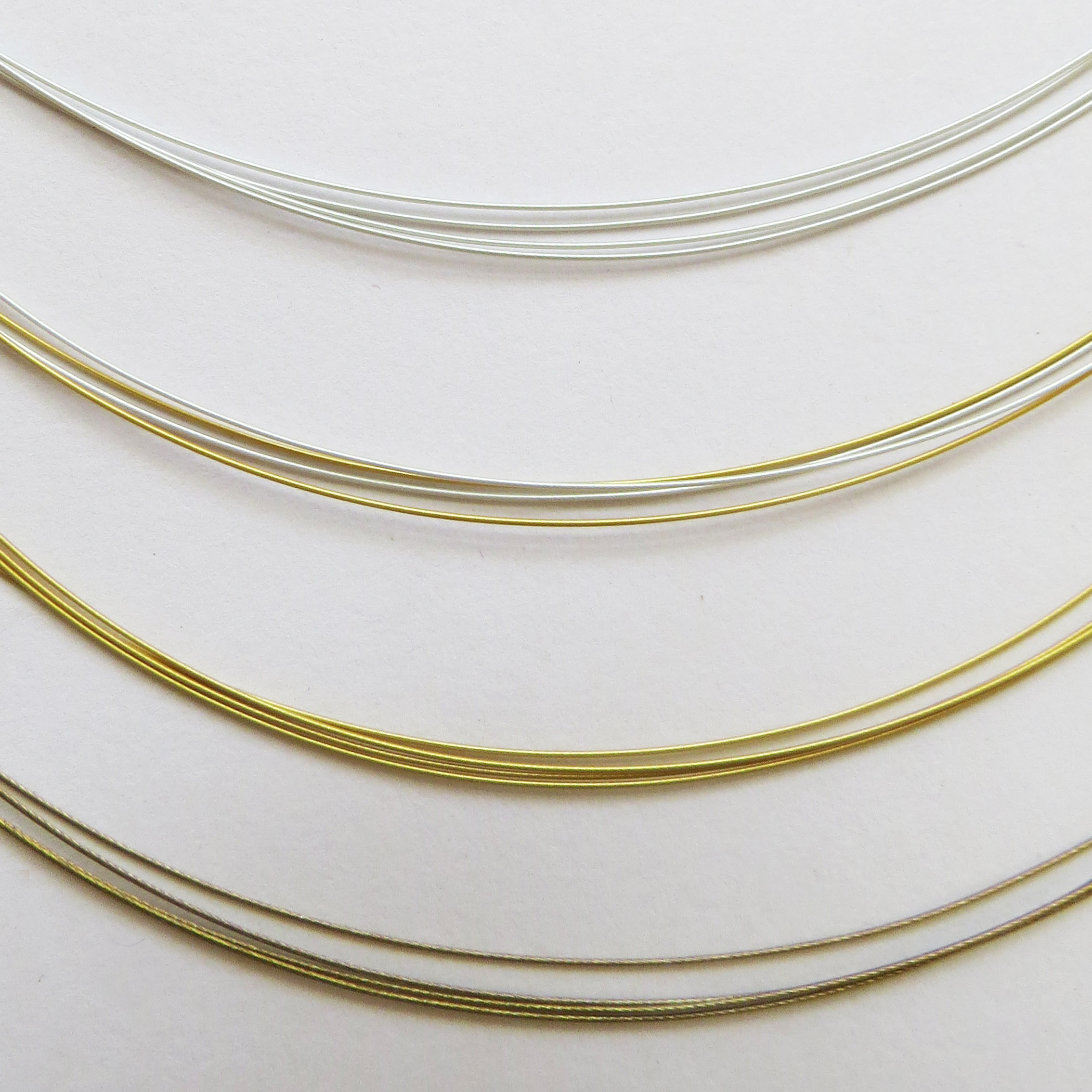 Detailed view of the dark gold, gold, mixed (2 strands silver and gold) and silver wires.