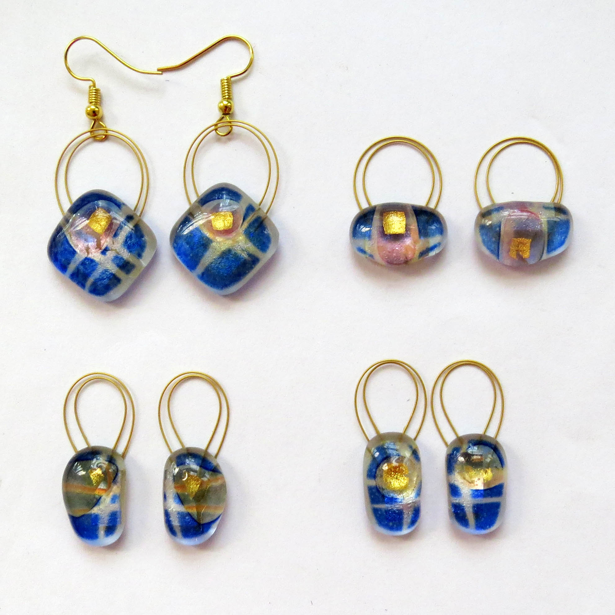 Example of larger hanging earrings, available in a lot of different colours and styles. They are all single piece pairs.